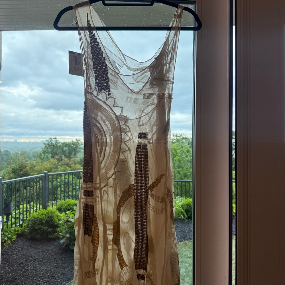 A work of arte dress! Never worn with tags! Vintage Italian made dress!